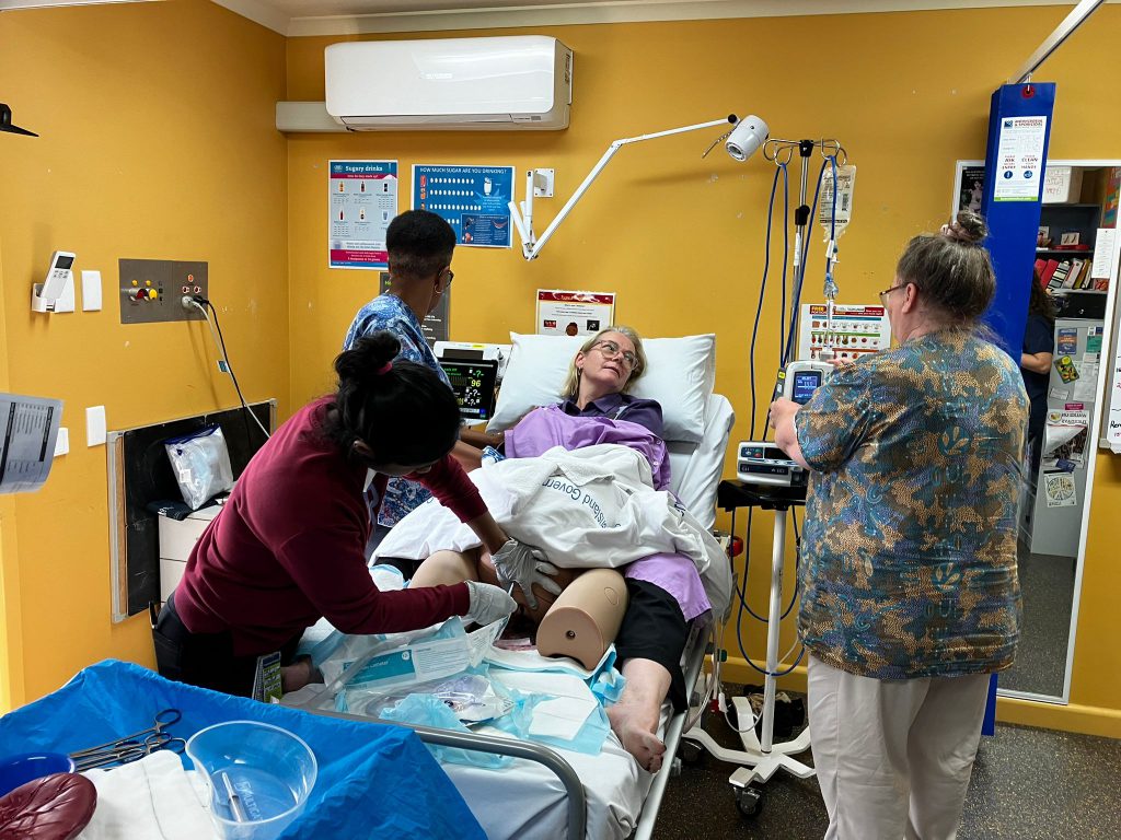 Clinician practicing emergency birth skills in the CSDS Maternity Emergency Program (MEP)